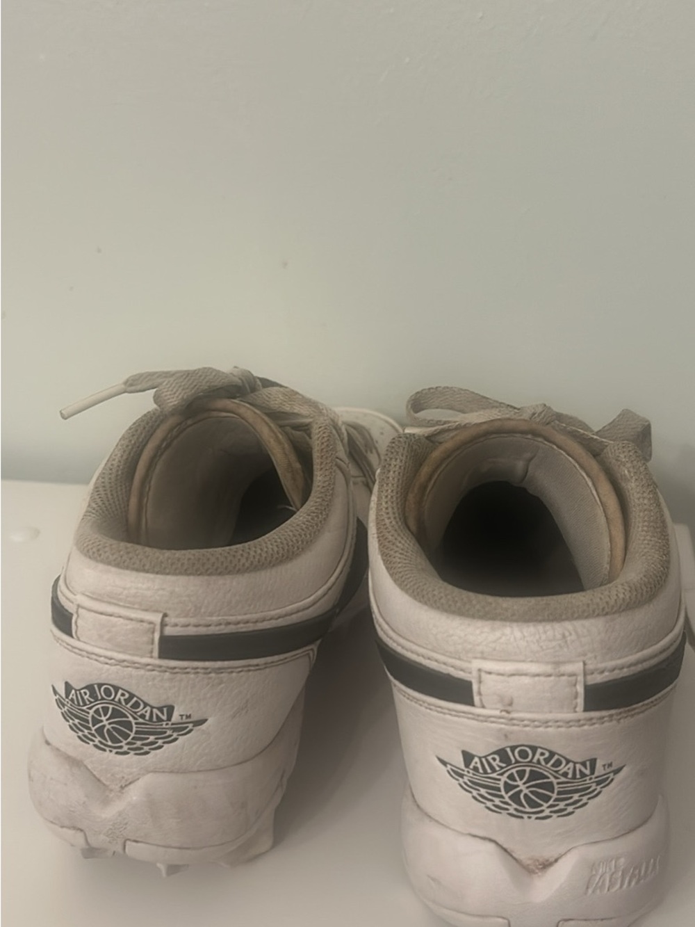 Nike Air Jordan White and Black Low-Top football cleats 6y